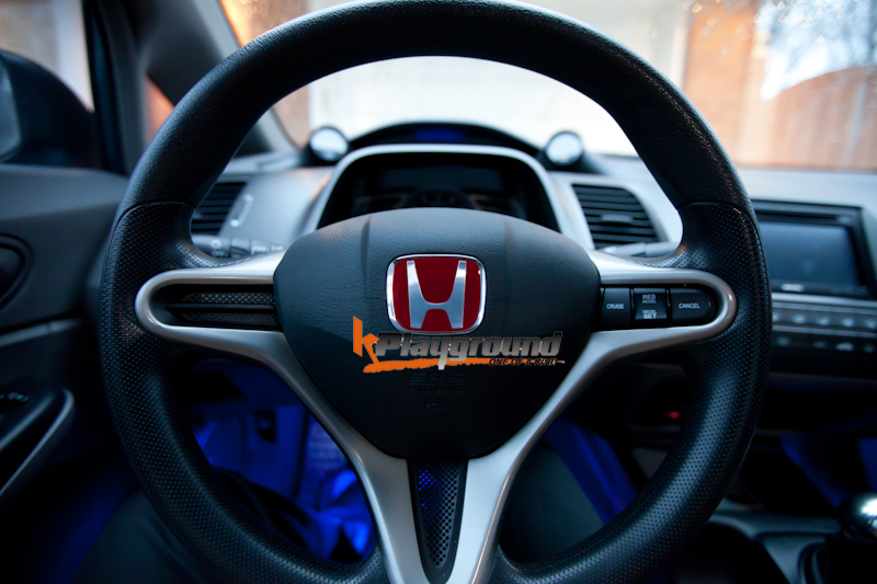 Blue honda emblem steering wheel